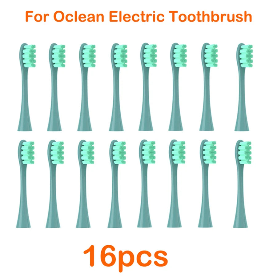 A set of sixteen replacement brush heads for an Ocean electric toothbrush, shown in various shades of green.