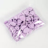A clear plastic bag filled with purple latex-free finger puffs for makeup application.