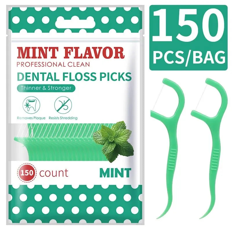 A package of 150 count mint flavor dental floss picks and toothpicks with two green plastic picks shown.