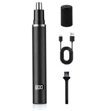 A black cordless hair grooming kit with a cylindrical body, a detachable head, and a charging cable.