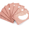 Pile de masques hydrogels roses pour extensions de cils.