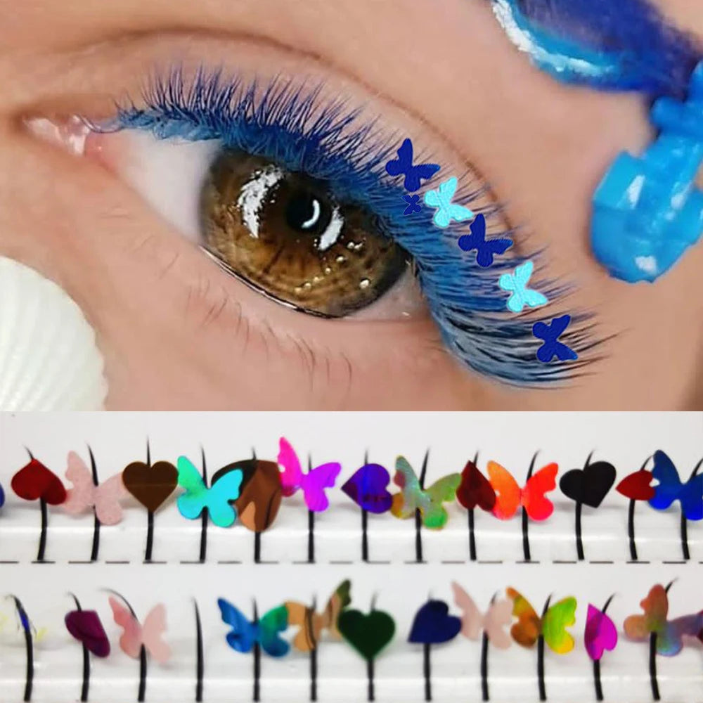 A close-up of an eye showing blue and purple eyelash clusters applied to the lash line.