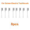Eight replacement brush heads for an Ocean electric toothbrush, shown individually.
