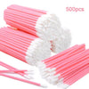A pile of 500 pink and white disposable lip wands.