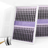 A display of black manga style invisible bond eyelashes in a clear packaging box.