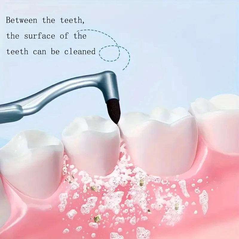 A manual tooth stain remover with an interdental brush cleaning between teeth surfaces.
