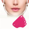 A pink silicone mask shaped like a V-line contour is shown against a white background.