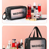 A black cosmetic storage bag labeled WASHBAG is displayed alongside various makeup and skincare products.