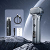 A silver portable electric shaver for men is shown against a dark, snowy background with charging cable and manual.