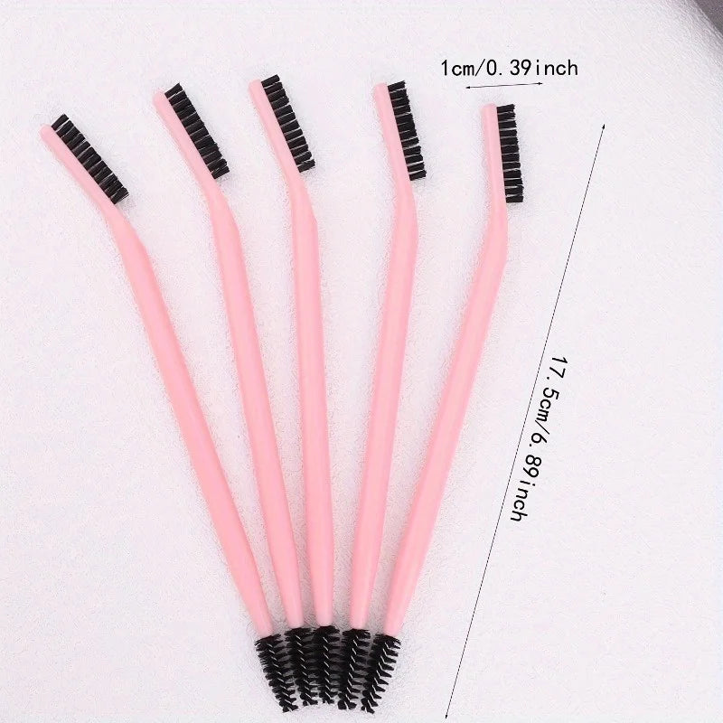 A set of pink dual-ended eyelash curlers and a brow brush shown on a white background.