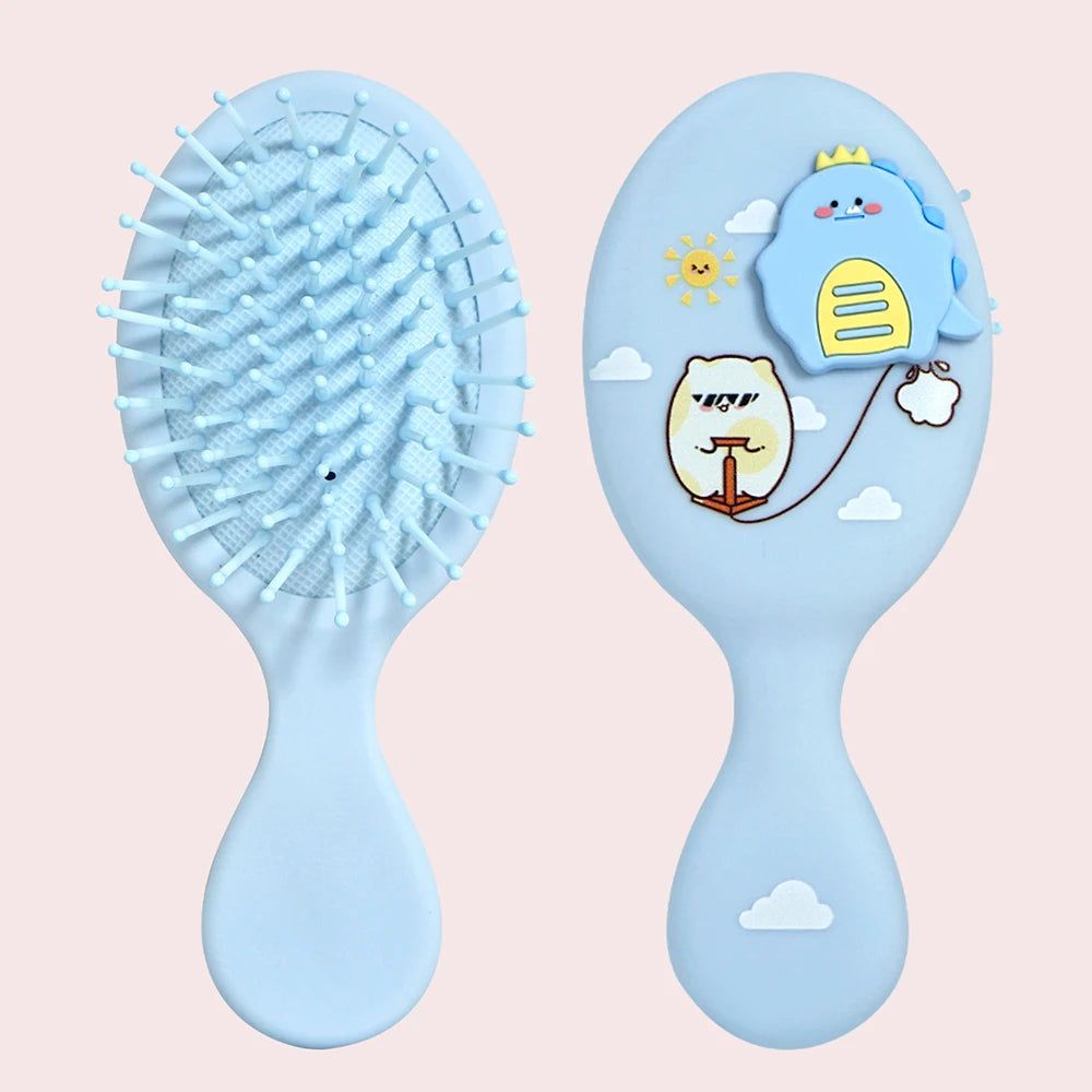 A light blue cartoon mini air cushion massage comb with a crown and a smiling cloud design.
