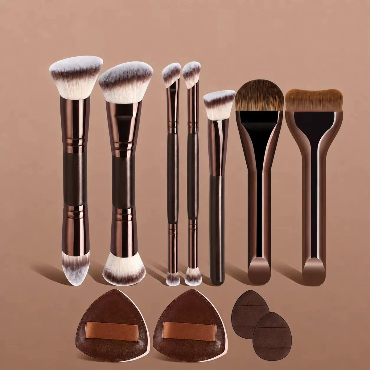 A set of seven professional makeup brushes in various sizes and shades displayed against a neutral background.
