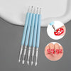 A set of light blue nail art liner brushes with ultra-fine tips shown next to a hand demonstrating their use.