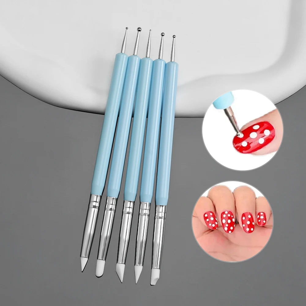 A set of light blue nail art liner brushes with ultra-fine tips shown next to a hand demonstrating their use.
