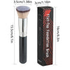 A black flat-top foundation brush with a brown bristles and a black box packaging.