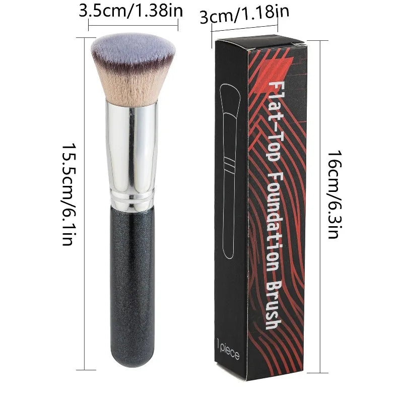 A black flat-top foundation brush with a brown bristles and a black box packaging.