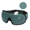 Mascarilla para dormir ergonómica de color verde azulado oscuro con textura de malla y un mechón de espuma blanca visible.