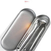 A silver stainless steel U-shaped tongue scraper is shown in a close-up view.