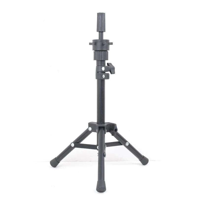 A black adjustable wig stand tripod with a stable base.