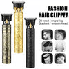 A set of fashion hair clippers featuring gold and black heads for various haircuts.