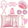 A pink heatless curling kit featuring silk accessories including a hair tool, a pink pad, and pink rollers.