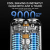Close-up view of a silver electric shaver with blue light accents, highlighting the motor and shaving mechanism.