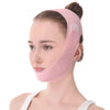 A woman is wearing a pink V-Line face slimming lifting bandage on her face.