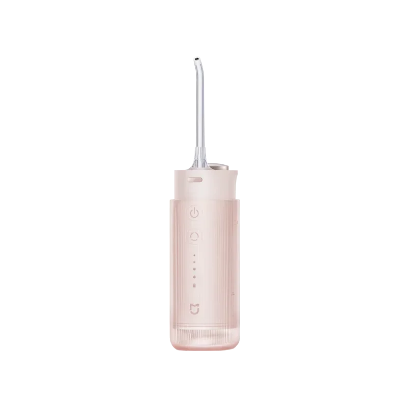 A pink portable cordless oral irrigator with a long nozzle and several control buttons.