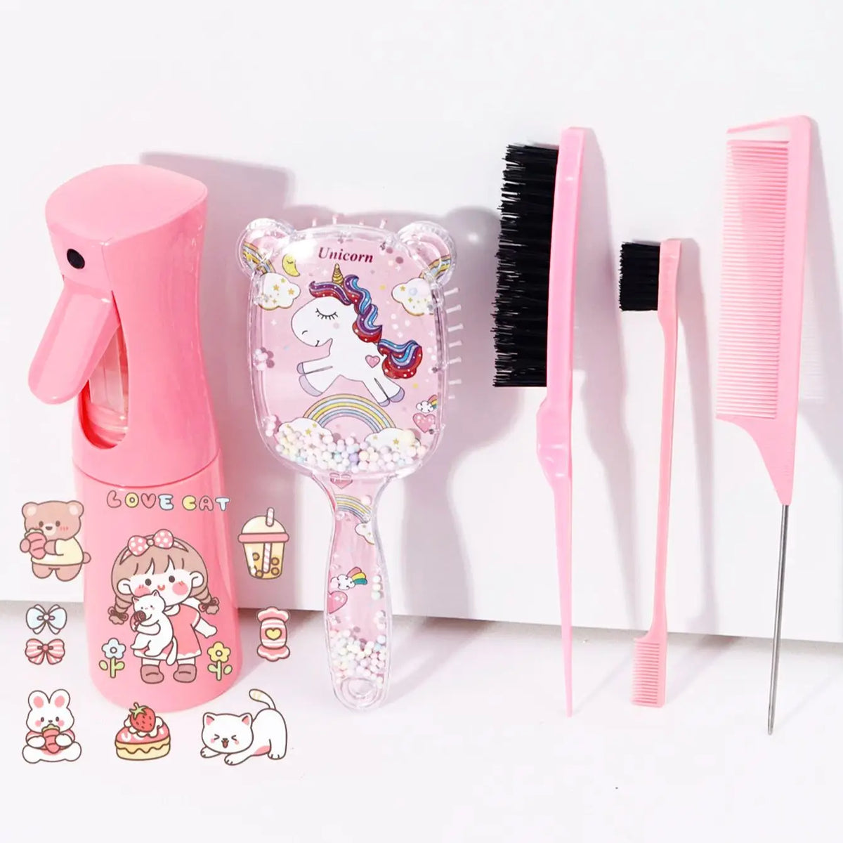 A pink unicorn themed 5-piece DIY hair styling kit featuring a brush, comb, and spray bottle.