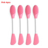 A set of four pink silicone facial mask applicators shown individually against a white background.