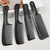 A set of four black anti-static carbon hair combs displayed on a white background.