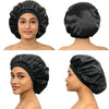 A set of black satin heatless curling rod headbands shown on a model's face and head.