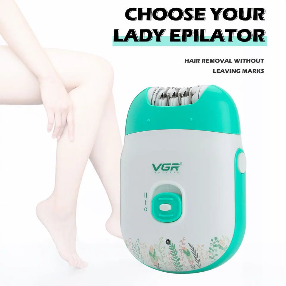 A white and teal rechargeable lady epilator device is shown next to a person's leg.