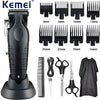 A black professional electric hair clipper grooming kit with various attachments and a fabric garment shown.