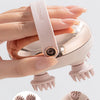A person holds a pink electric handheld scalp massager with four massage heads, demonstrating its use for comfort.
