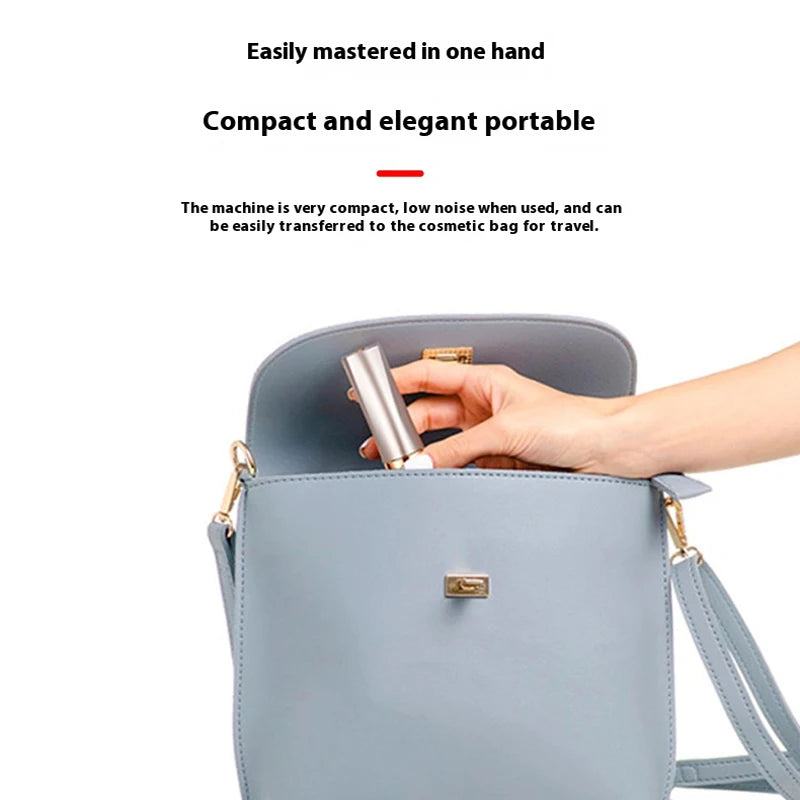 A hand is holding a compact, light gray cosmetic bag with a silver hair removal device inside.