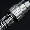 Close-up view of a silver double edge safety razor component with a numbered marking.