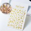 A sheet of gold foil nail decals featuring various floral and leaf designs for professional nail art.