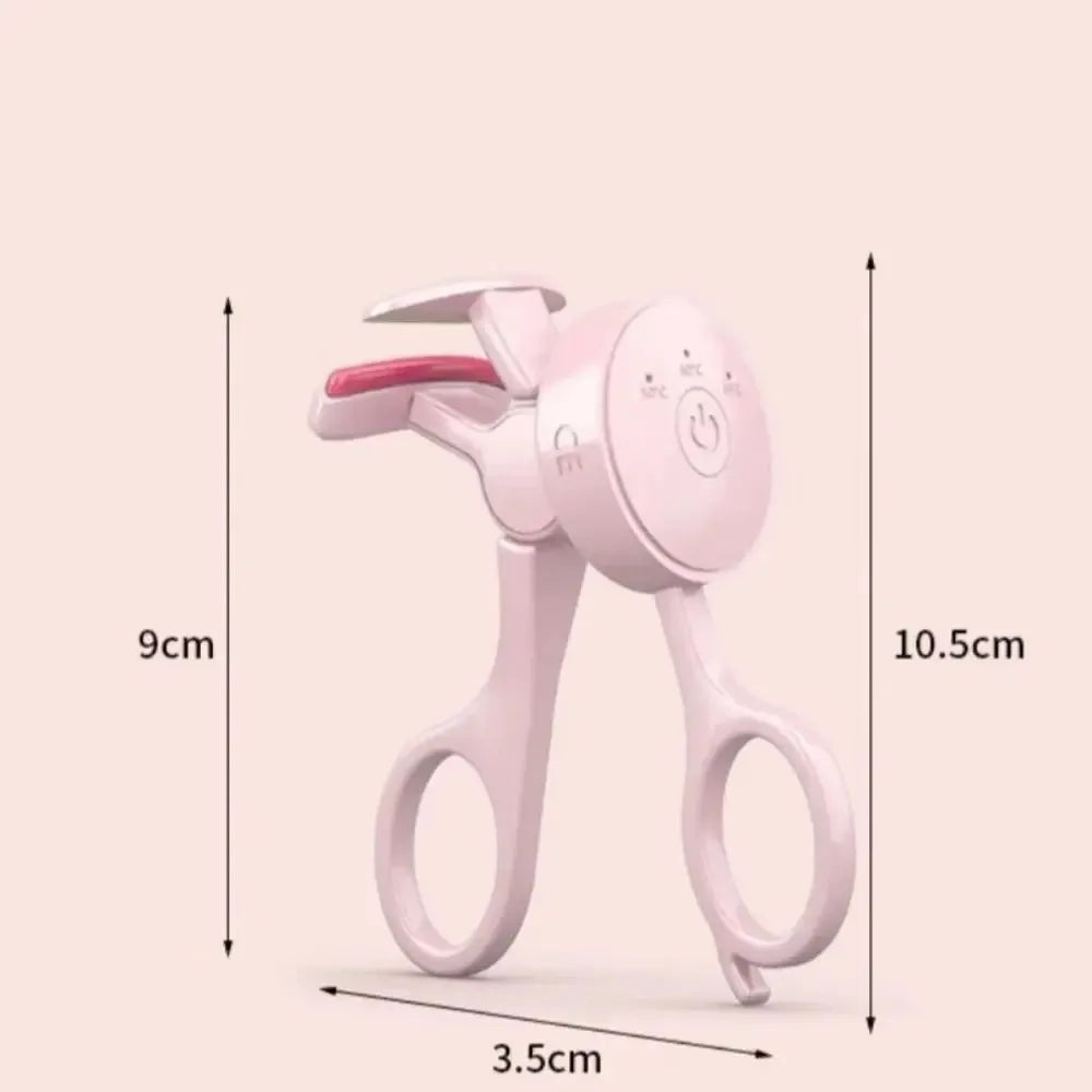 A pink frameless heated eyelash curler with temperature control shown against a light background.