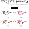 Un juego de gafas de lectura elegantes con varios colores, incluyendo negro, rosa, naranja, rojo y azul.