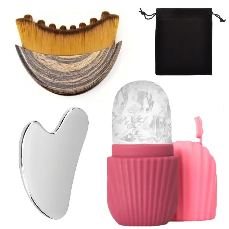 A set of stainless steel gua sha and ice roller facial massage tools in black, pink, and gold tones.
