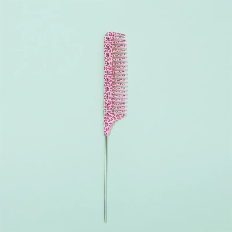 A pink anti-static rat tail comb with fine teeth shown against a light mint green background.