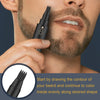 A hand is using a black beard shaping pen to draw the contour of a man's beard.