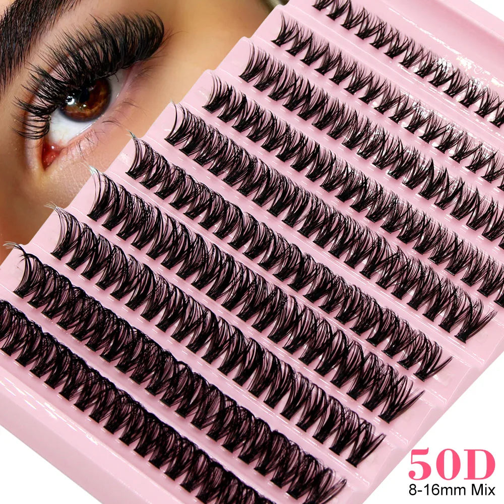 A close-up of a pink lash tray showing various clusters of black false eyelashes for volume extensions.