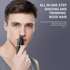 A man is holding a black nose hair trimmer grooming tool for daily use.