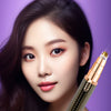 A woman is shown using a sharp and smooth eyebrow blade for shaping eyebrows.
