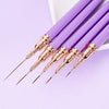 Un set de pinceaux liners pour ongles professionnels avec des manches violets et des ferrules dorées.