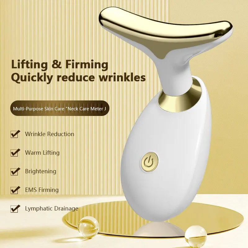A white electric facial lifting and firming massager with a gold accent, shown against a light background.