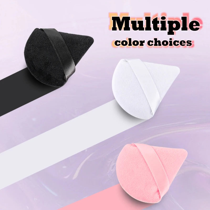 A set of multiple color choices for reusable velvet powder puffs in black, white, and pink.
