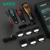 A collection of VGR professional electric hair clipper trimmers including various blades and accessories.